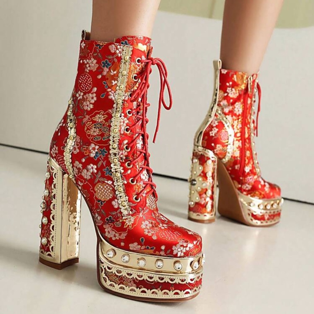 Chic Red Floral Heeled Boots with Gold Accents
